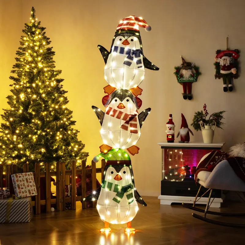 Beleuchtete Pinguin-Dekoration mit warmweißen Lichtern und niedlichen Hüten